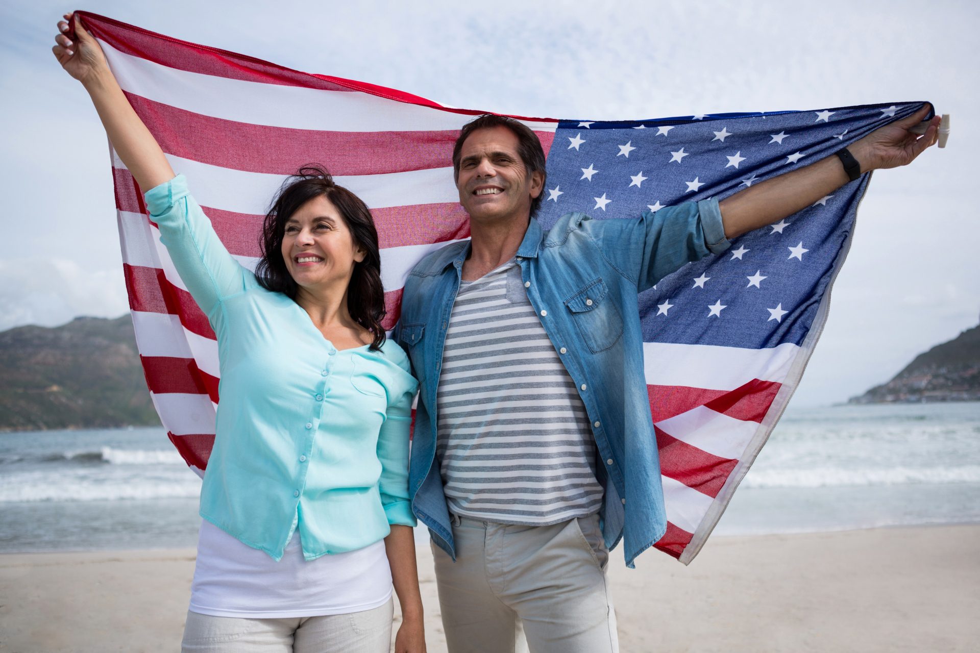 Couple holding american flag